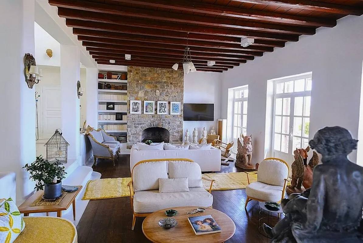 Villa Megalo — reception room with fireplace